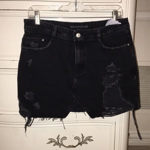 Black distressed, denim skirt